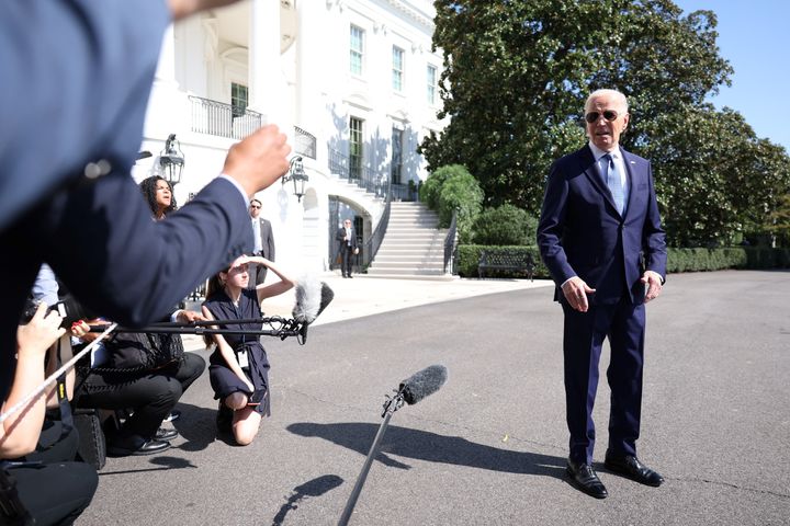 President Joe Biden speaks to the press before boarding Marine One on the South Lawn of the White House in Washington, D.C., on Oct. 5, 2024, as he heads to South Bend, Indiana.