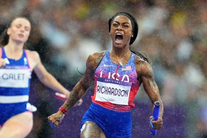 Sha'carri Richardson crosses the finish line to win the gold medal in the women's 4 x 100 meters relay final at the 2024 Summer Olympics.