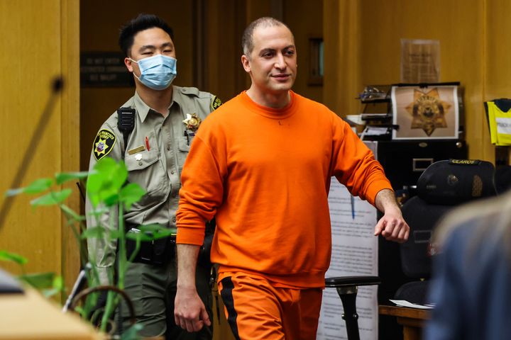 Nima Momeni, the man charged in the fatal stabbing of Cash App founder Bob Lee, makes his way into the courtroom for his arraignment in San Francisco, May 2, 2023. Momeni was found guilty Tuesday of second-degree murder.