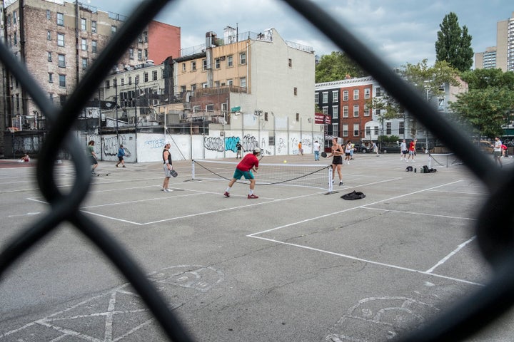 The popularity of Pickleball is a sign that people crave third spaces, professor Richard Kyte said. Here, people play pickleball in 2022 in New York City.