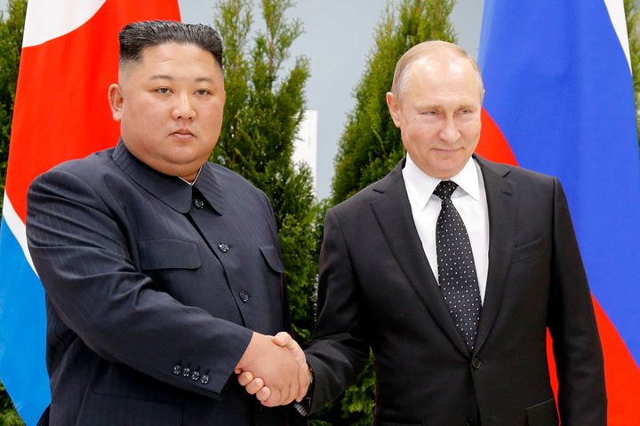 Russian President Vladimir Putin, right, and North Korea's leader Kim Jong Un shake hands during their meeting in Vladivostok, Russia, on April 25, 2019.