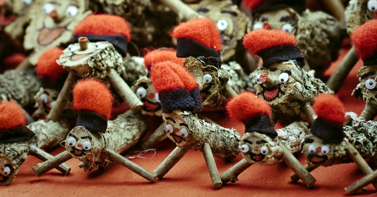 NextImg:From Pooping Logs to Fierce Cats: The World's Quirkiest Holiday Traditions