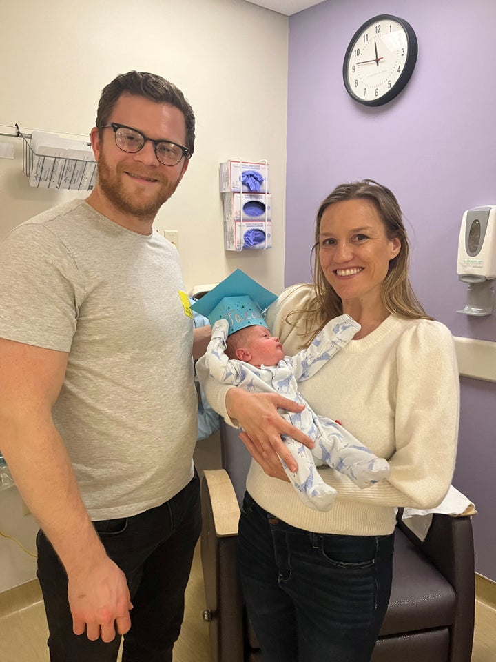 The author and her husband are seen with baby Jacob on his NICU graduation day, March 15.