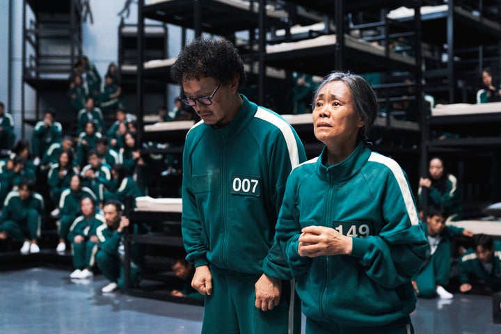 Yang Dong-geun as Park Yong-sik, Kang Ae-sim as Jang Geum-ja in "Squid Game" Season 2.