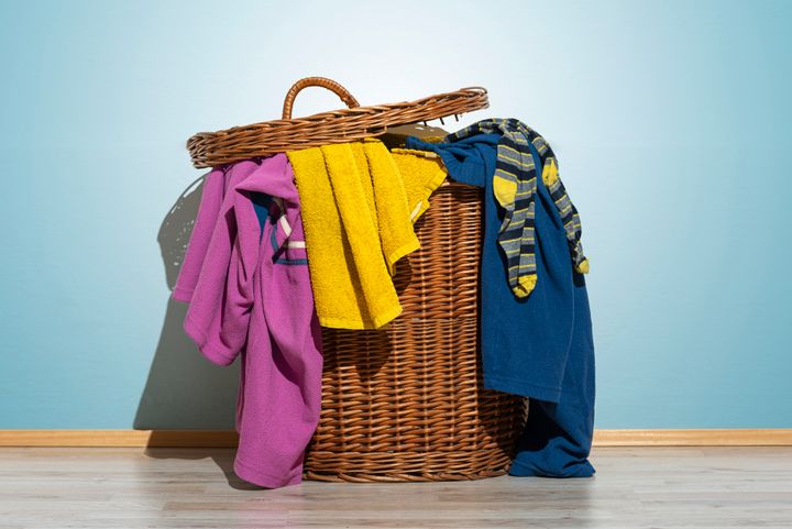 Norovirus is the most likely virus to be lingering on your unwashed clothes.