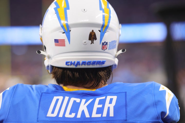 Los Angeles Chargers place kicker Cameron Dicker stands on the sideline during the first half an NFL football game against the Denver Broncos, Thursday, Dec. 19, 2024, in Inglewood, Calif. (AP Photo/Ryan Sun)