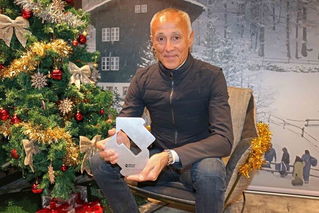 Andrew Ridgeley celebrating Wham!'s festive number one