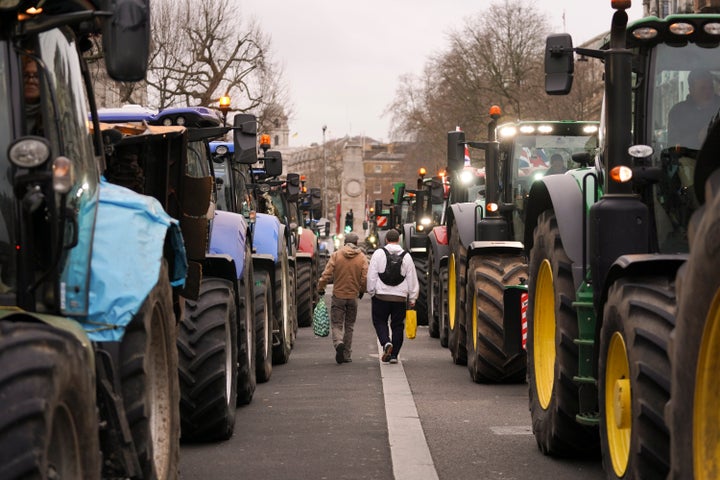 Tractors line up in Westminster by farmers, as part of a protest against the planned changes to tax rules, in London, Wednesday, Dec. 11, 2024.