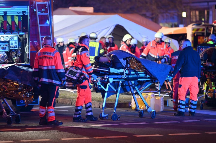 Emergency services, police and firefighters respond to the scene after a driver drove into a group of people at the Christmas market in Magdeburg. (Photo by Heiko Rebsch/picture alliance via Getty Images)