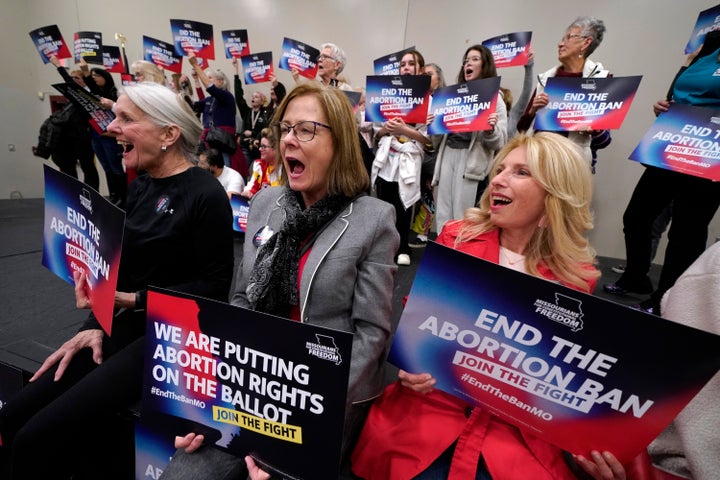 FILE - Missouri residents and abortion-rights advocation react to a speaker during Missourians for Constitutionals Freedom kick-off petition drive, Feb. 6, 2024 in Kansas City, Mo. (AP Photo/Ed Zurga, File)