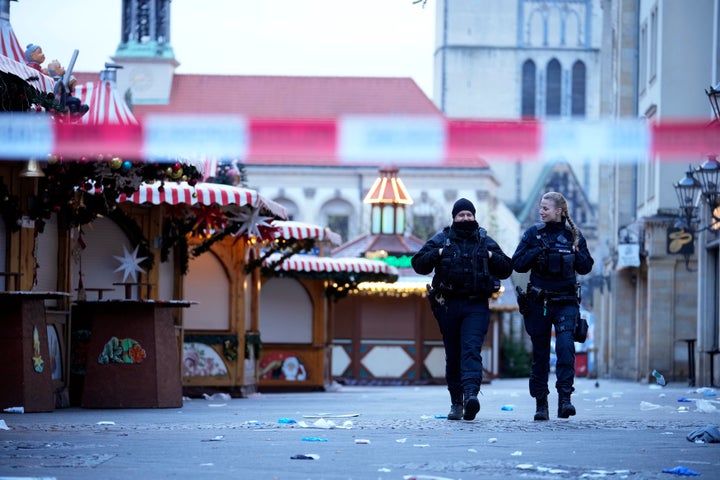 At Least 5 Lifeless, Extra Than 200 Injured In German Christmas Market Assault 2 Police officers patrol a cordoned-off area at a Christmas Market, where a car drove into a crowd on Friday evening, in Magdeburg, Germany, Saturday, Dec. 21, 2024. (AP Photo/Ebrahim Noroozi)