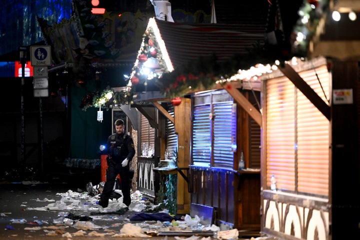 At Least 5 Lifeless, Extra Than 200 Injured In German Christmas Market Assault 4 A policeman is seen at the Christmas market where an incident happened in Magdeburg, Germany, Friday Dec. 20, 2024. (Heiko Rebsch/dpa via AP)