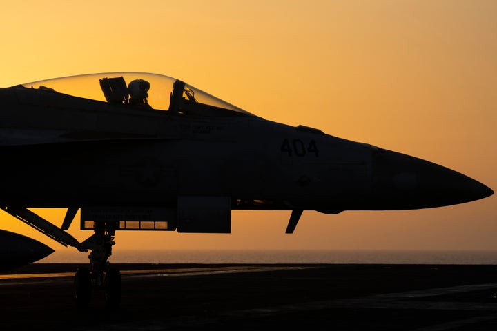 FILE - A fighter jet maneuvers on the deck of the USS Dwight D. Eisenhower in the Red Sea, June 11, 2024. (AP Photo/Bernat Armangue, File)