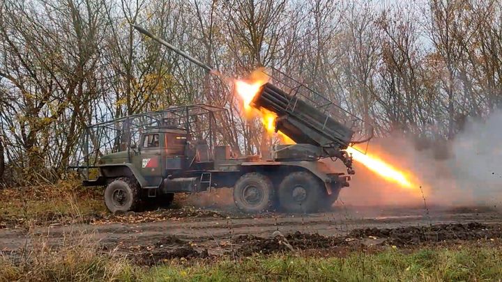 In this photo taken from video released by the Russian Defense Ministry on Tuesday, Dec. 3, 2024, a "Grad" self-propelled 122 mm multiple rocket launcher fires toward Ukrainian position in the Russian - Ukrainian border area in the Kursk region, Russia. (Russian Defense Ministry Press Service photo via AP)