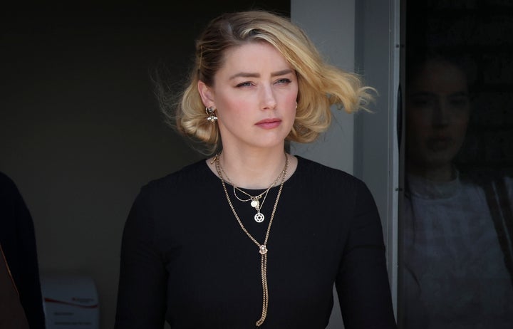 Amber Heard leaves a Virginia courthouse in June 2022, after a jury ruled that she had defamed her ex-husband Johnny Depp. The actor called Lively's accusations against Baldoni "horrifying" in a statement to NBC News.