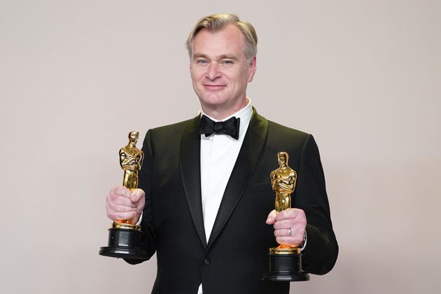 Christopher Nolan celebrating his two wins at the Oscars earlier this year