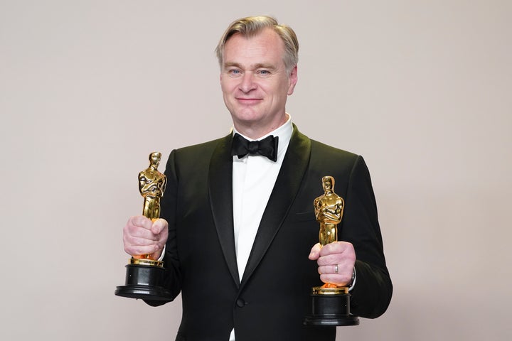 Christopher Nolan celebrating his two wins at the Oscars earlier this year