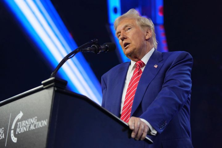 President-elect Donald Trump speaks at AmericaFest, Sunday, Dec. 22, 2024, in Phoenix. (AP Photo/Rick Scuteri)