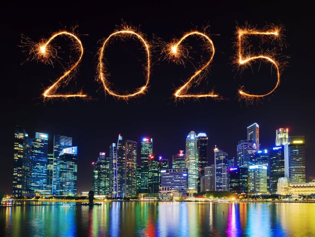 2025 Happy New Year fireworks celebrating over Singapore cityscape at night