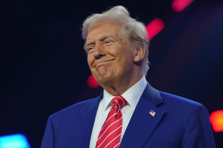 President-elect Donald Trump speaks at AmericaFest, Sunday, Dec. 22, 2024, in Phoenix. (AP Photo/Rick Scooteri)