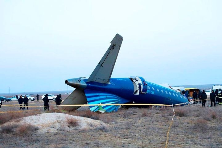 In this photo taken from a video released by the administration of Mangystau region, a part of Azerbaijan Airlines' Embraer 190 lies on the ground near the airport of Aktau, Kazakhstan, on Dec. 26, 2024.