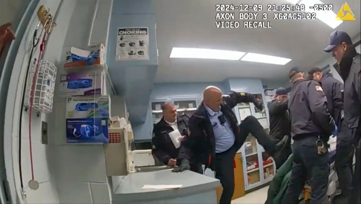 This image provided by the New York State Attorney General office shows bodycam footage of correction officers beating a handcuffed man, Robert Brooks, 43, at the Marcy Correctional Facility in Oneida County, N.Y., on Dec. 9, 2024. (New York State Attorney General office via AP)