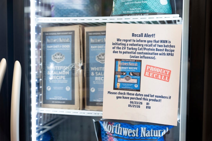 A recall alert is displayed on a refrigerator at a pet store in Tigard, Oregon, on Thursday, Dec. 26, 2024, after Northwest Naturals announced a voluntary recall Tuesday of one batch of its 2-pound Feline Turkey Recipe raw frozen pet food after it tested positive for the virus.