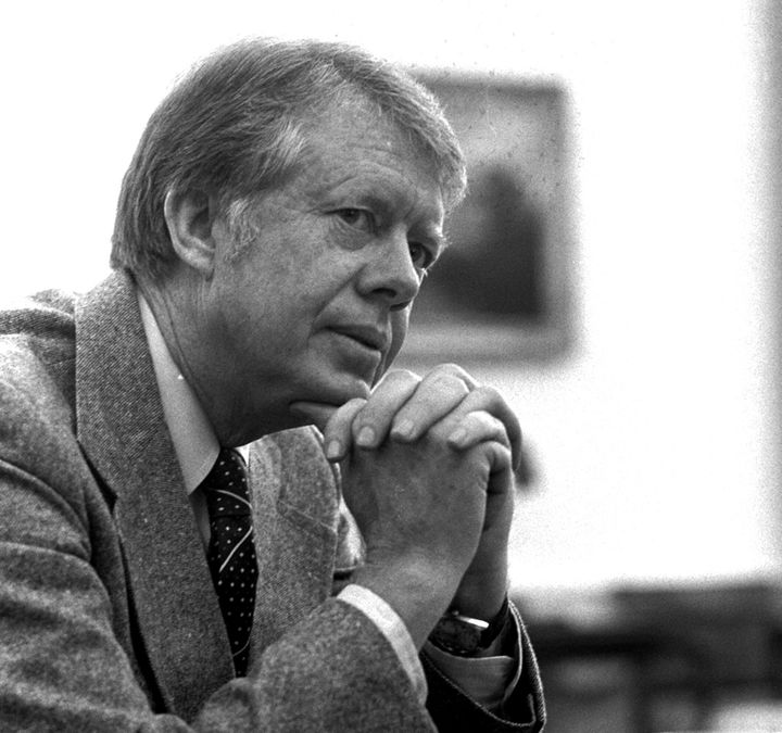 FILE - President Jimmy Carter is interviewed in the Oval Office of the White House in Washington, Jan. 24, 1977. (AP Photo, File)