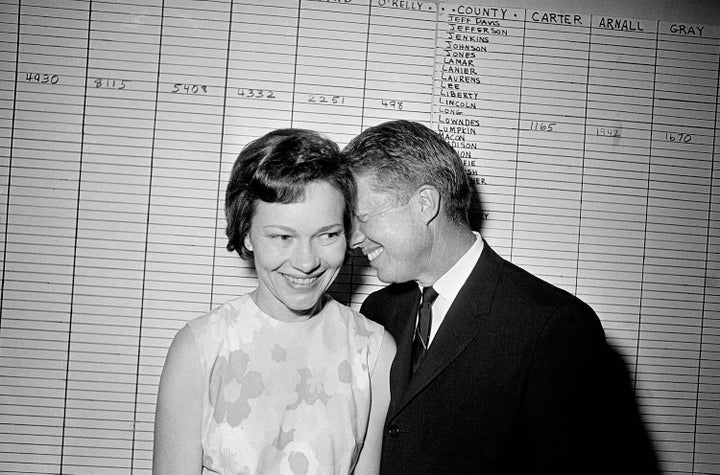 FILE - Georgia state Sen. Jimmy Carter hugs his wife, Rosalynn, at his Atlanta campaign headquarters, Sept. 15, 1966. (AP Photo, File)