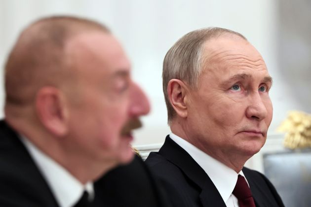 Russian President Vladimir Putin, right, and Azerbaijani President Ilham Aliyev