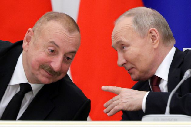 Russian President Vladimir Putin, right, and Azerbaijani President Ilham Aliyev in Moscow, Russia, Monday, April 22, 2024