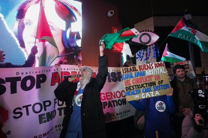 Pro-Palestinian demonstrators hold a vigil in London's Piccadilly Circus in response to Israel's destruction of Kamal Adwan Hospital in northern Gaza, on Dec. 28, 2024.