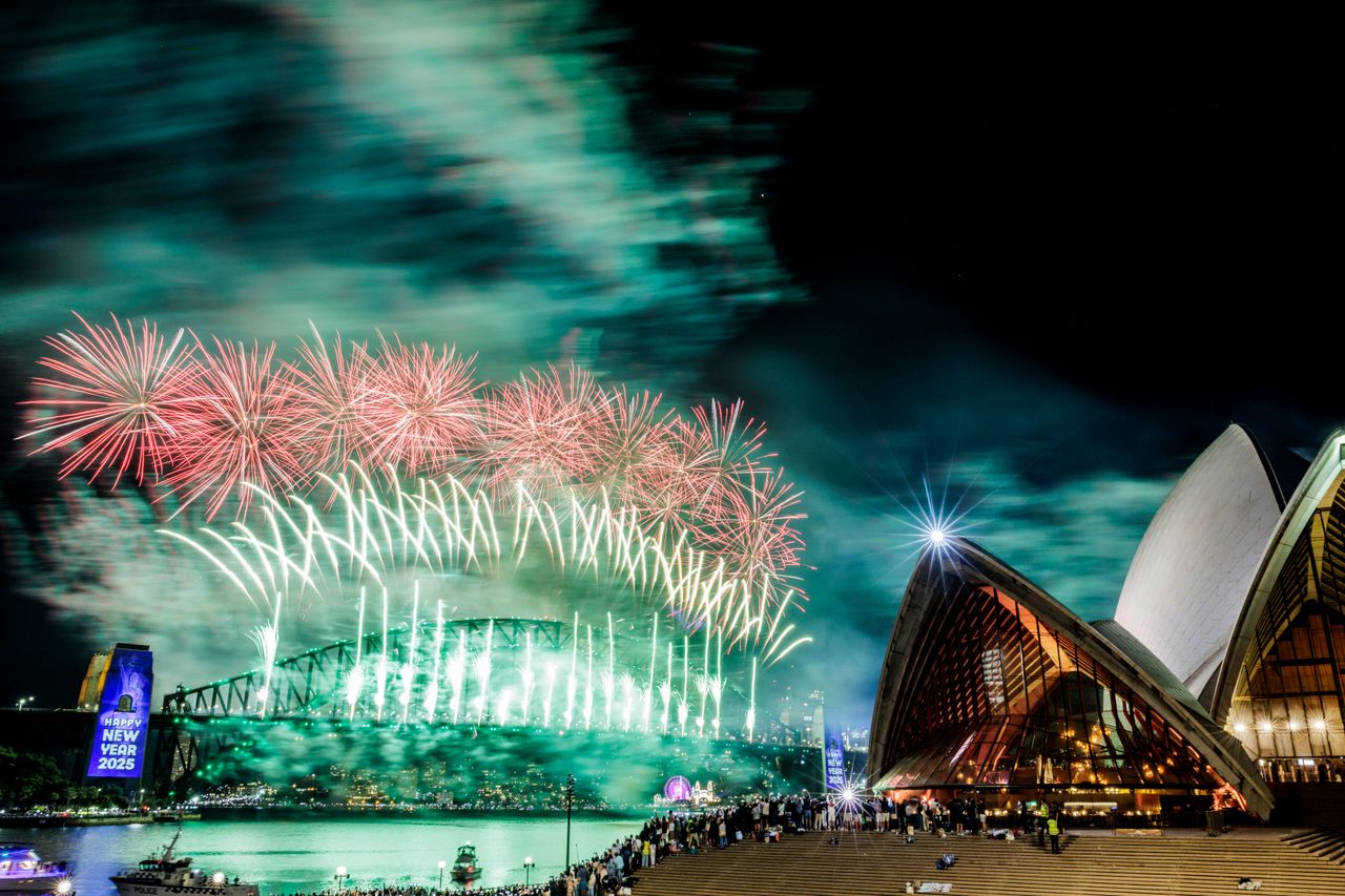 SYDNEY, AUSTRALIA - JANUARY 01: The Sydney NYE fireworks seen from the Sydney Opera House on January 01, 2025 in Sydney, Australia. An estimated one million people spent the new year watching Sydney's fireworks at vantage points around the harbour. (Photo by Brook Mitchell/Getty Images)