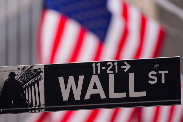 A street sign is seen in front of the New York Stock Exchange the New York Stock Exchange, Tuesday, Feb. 27, 2024, in New York. (AP Photo/Frank Franklin II)
