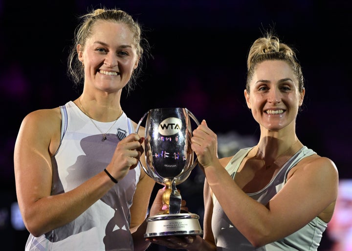 Gabriela Dabrowski (right) of Canada and Erin Routliffe of New Zealand smile after winning women's doubles at the WTA Finals on Nov. 9 in Riyadh, Saudi Arabia.