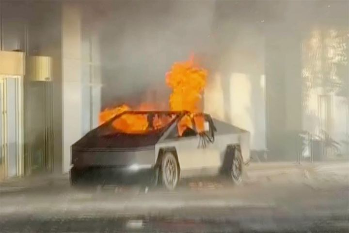 A Tesla Cybertruck that exploded outside President-elect Donald Trump's Las Vegas hotel early Wednesday is seen burning.