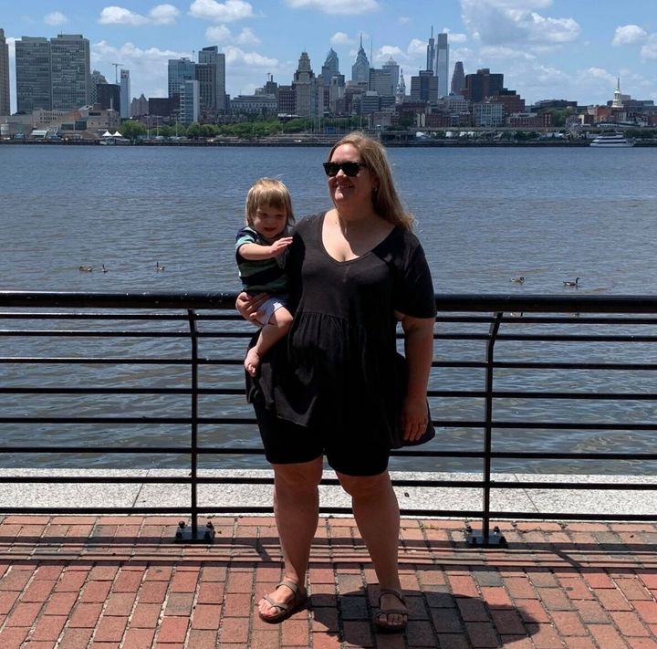 The author and her second, nocturnal baby in front of the Philadelphia skyline.