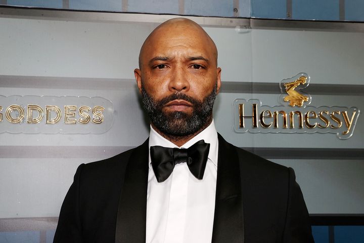 Joe Budden, shown here at an April 2022 event in New York City, was accused by a neighbor of standing naked in their apartment building's hallway.