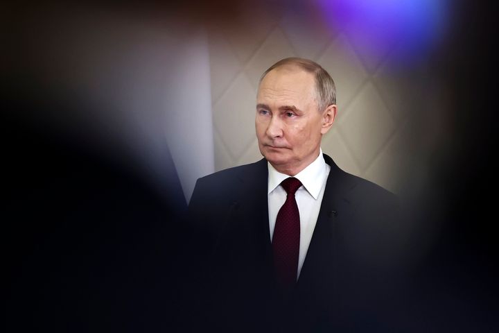 Vladimir Putin appears before the media after the summit of the Collective Security Treaty Organization in Astana, Kazakhstan.