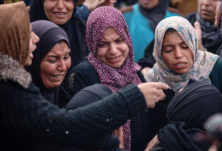 Women react at the funeral of Palestinians killed in an Israeli strike, amid the Israel-Hamas conflict, at Al-Aqsa Martyrs Hospital in Deir el-Balah, Gaza Strip, on January 5, 2025. (Photo by Majdi Fathi/NurPhoto via Getty Images)