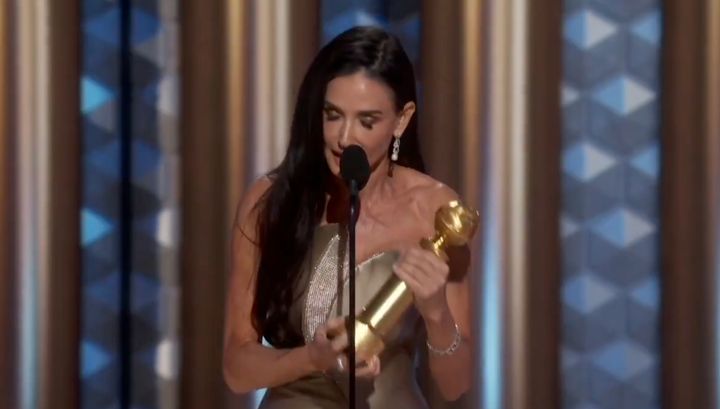 Demi Moore accepting her first Golden Globe thanks to her performance in the body horror movie The Substance