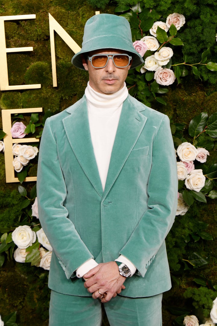 Jeremy Strong attends the 2025 Golden Globe Awards at The Beverly Hilton in a bucket hat.