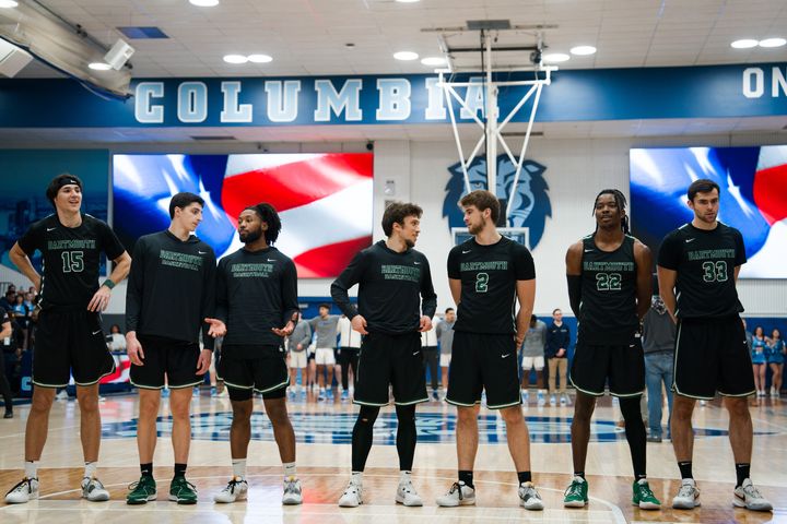 Union leaders Romeo Myrthil, #20 (fourth from left), and Cade Haskins, #2 (fifth from left), with their teammates in a game at Columbia University in New York City last February.