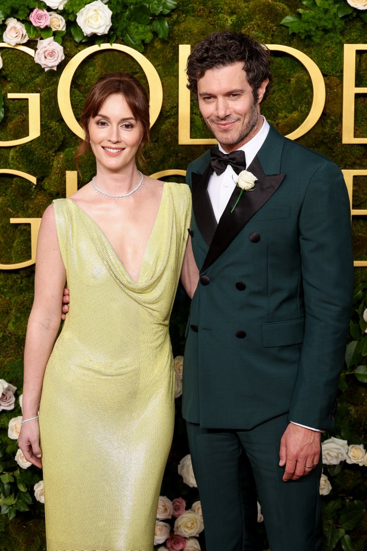 Leighton Meester and Adam Brody during the 82nd Annual Golden Globes Sunday. The pair shared a sweet moment on the red carpet prior to the award show.