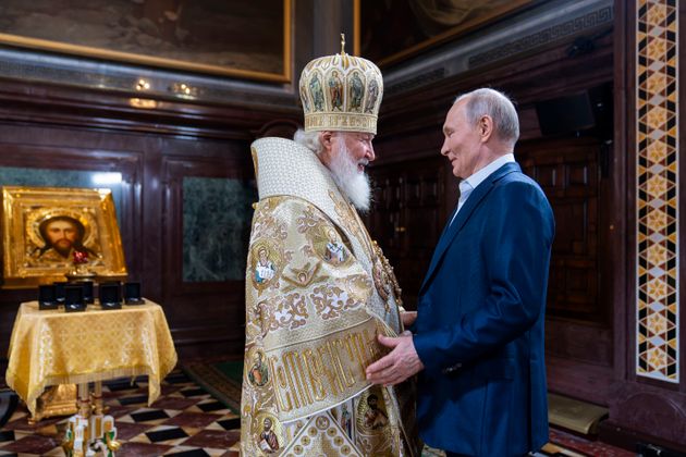 In this photo released by Russian Orthodox Church Press Service, Russian Orthodox Patriarch Kirill, left, and Russian President Vladimir Putin.