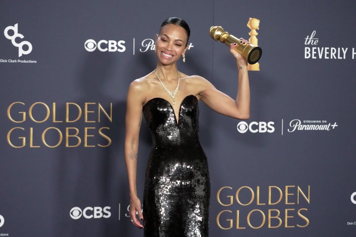 Zoe Saldaña photographed holding her award for “Emilia Pérez” in the press room at the 82nd Annual Golden Globe Awards on Jan. 5 in Beverly Hills, California.