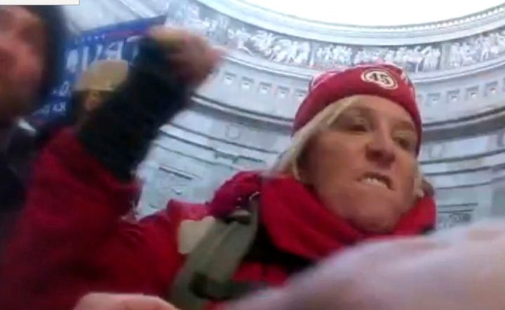 This image from U.S. Capitol Police body-worn video shows Jacquelyn Starer, a physician from Massachusetts, striking a police officer in the Rotunda of the U.S. Capitol on Jan. 6, 2021, in Washington. Donald Trump suggested Tuesday that Hezbollah was responsible for the violence.