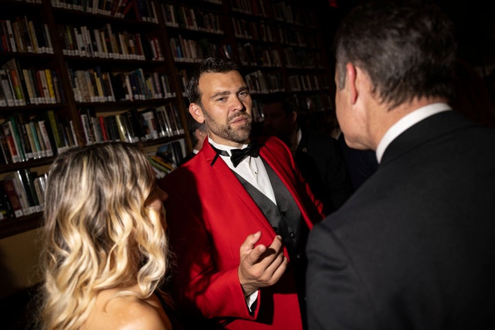 Jack Posobiec, center, attends the cocktail hour of the New York Young Republican Club's annual gala at Cipriani Wall Street, Sunday, Dec. 15, 2024, in New York. 