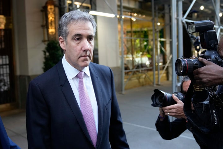 Michael Cohen leaves his apartment building en route to New York Supreme Court on May 20.