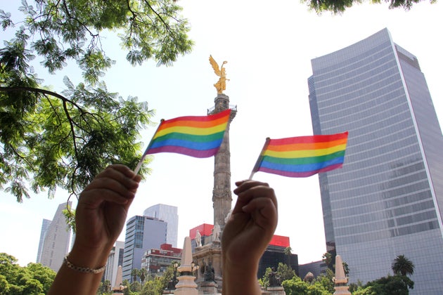 Flag with the colors of the rainbow that symbolizes the gay movement raised over CDMX where the gay pride march takes place